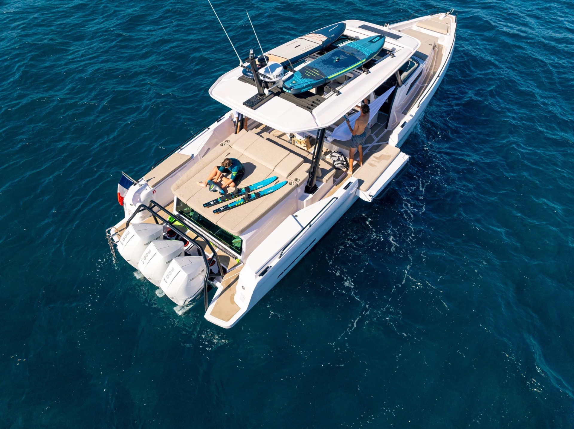 Overhead view of the Axopar 45 deck with paddleboards on the roof